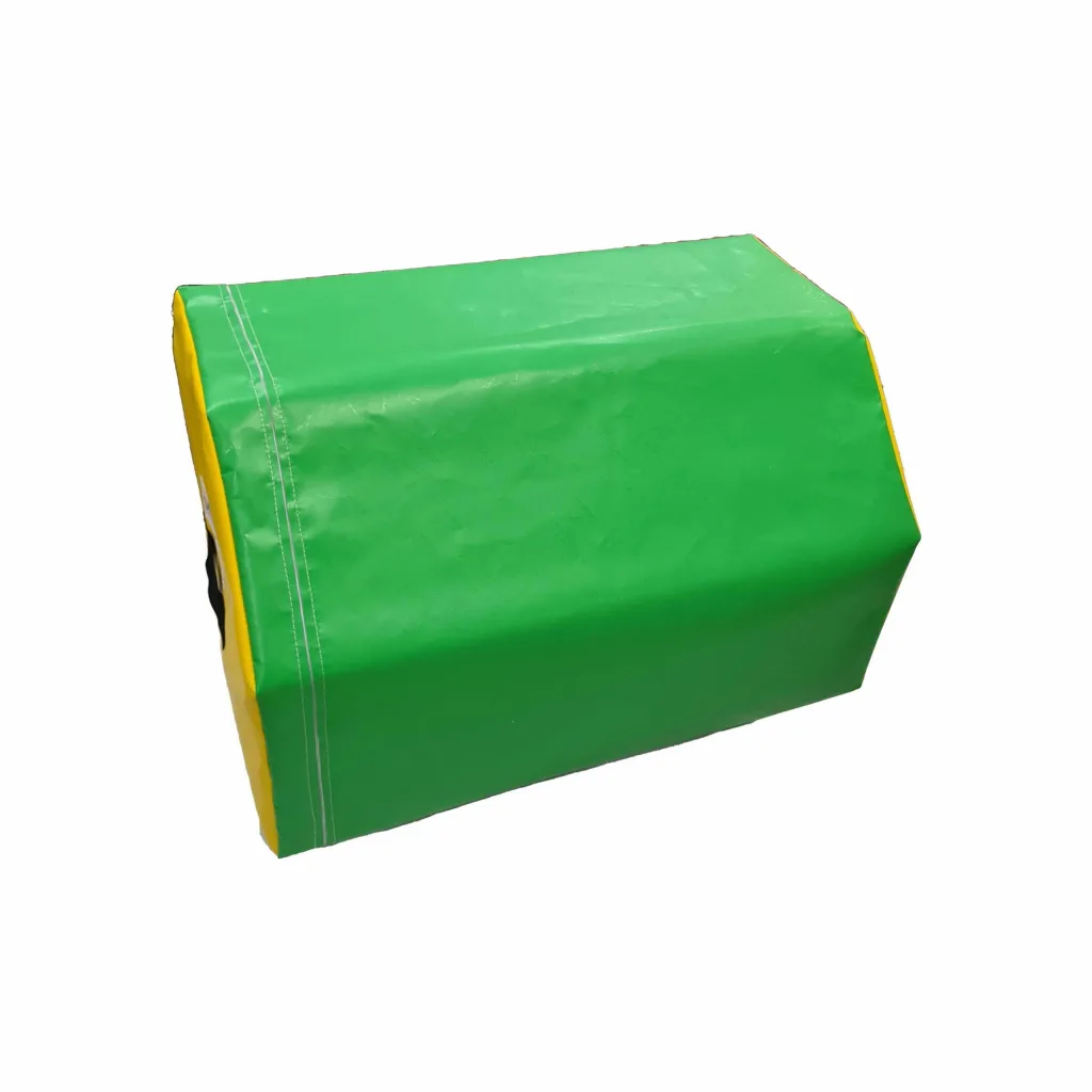Green octagonal gymnastics block with yellow end panels, heavy-duty flame-retardant PVC cover over high-density PU foam and black carry handles.