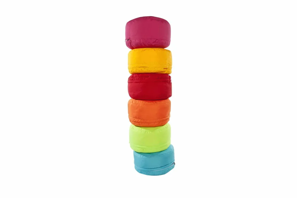 Stack of six round indoor/outdoor polyester bean pods in magenta, yellow, red, orange, lime green and light blue.
