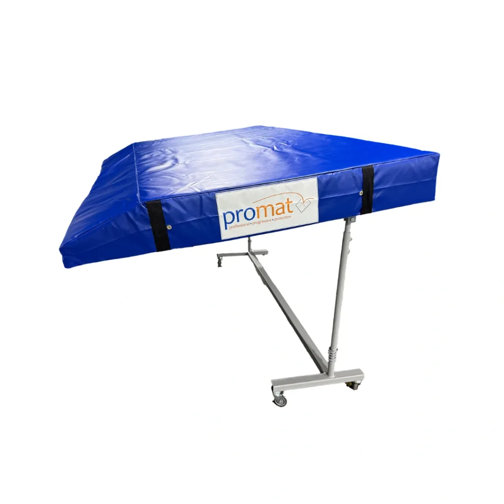 Blue spotting end deck on a folding wheel-away, sprung height-adjustable metal stand with casters, label reading "promat".