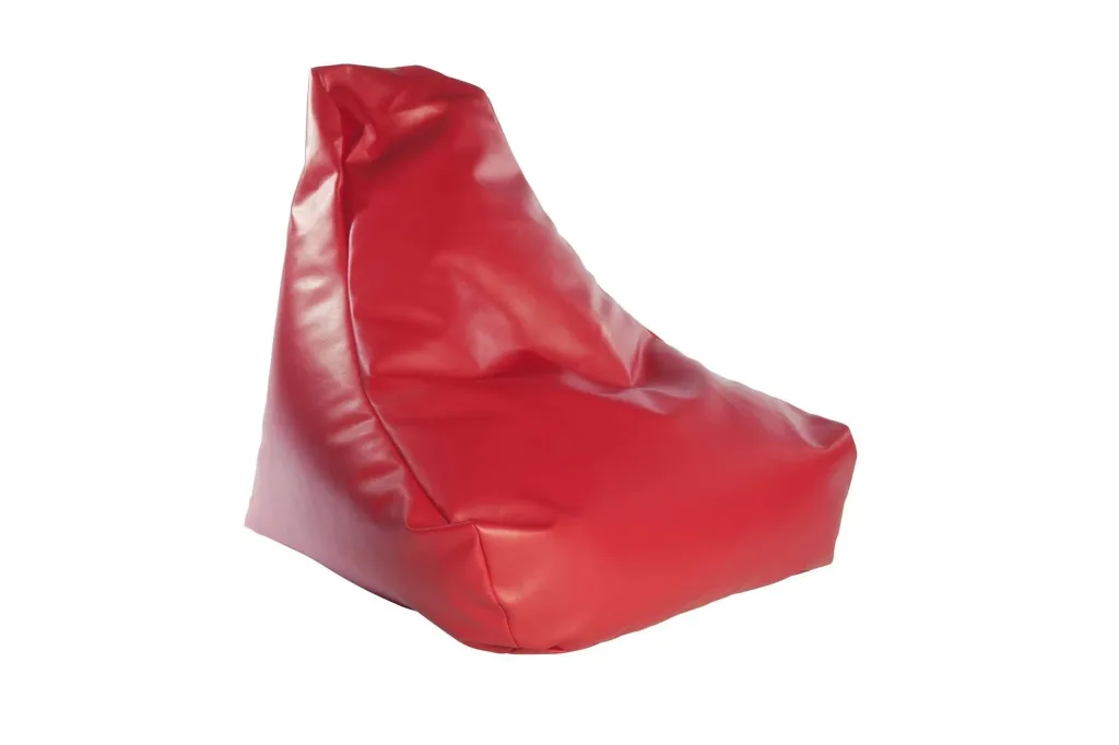 Red faux leather child bean chair with a high triangular back and low cushioned seat.