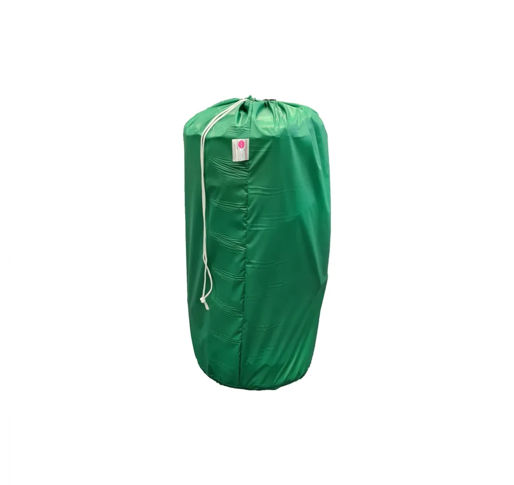 Green drawstring cylindrical storage bag with white cord containing a set of 10 child scatter cushions.