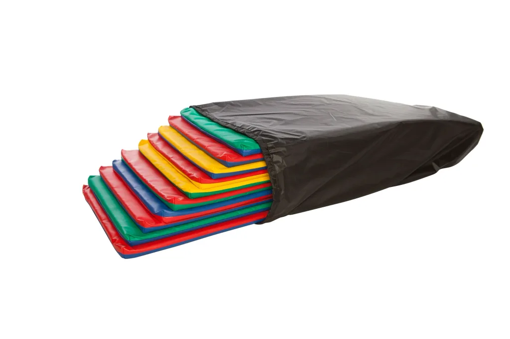Set of 10 sleeping mats stacked inside a nylon storage bag with multicolored covers.