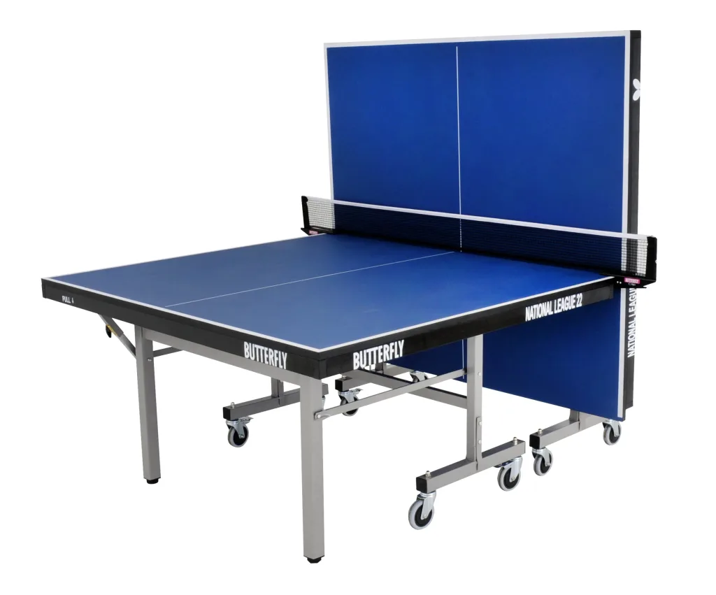Table tennis table with blue playing top, light silver legs and undercarriage, magenta corner pieces and wheels, playback half raised, text BUTTERFLY and NATIONAL LEAGUE 22.