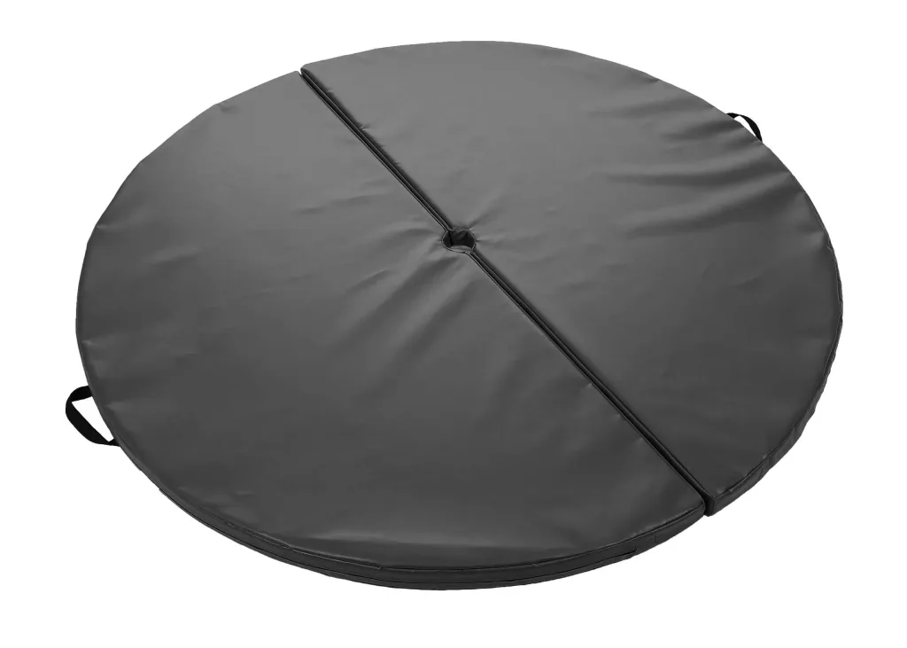 Round two-piece pole mat made of heavy-duty PVC with a central hole, midpoint seam, and fixed carry handles.