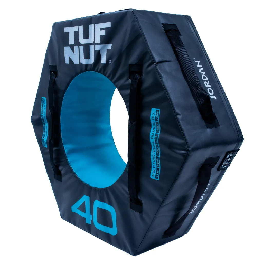 TUF NUT 40 hexagonal black training ring with bright blue inner circle, multiple black carry handles and JORDAN printed on the side.
