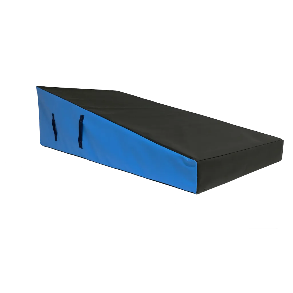 Black-top, blue-sided wedge block ramp with two carrying handles and heavy-duty flame-retardant PVC cover.