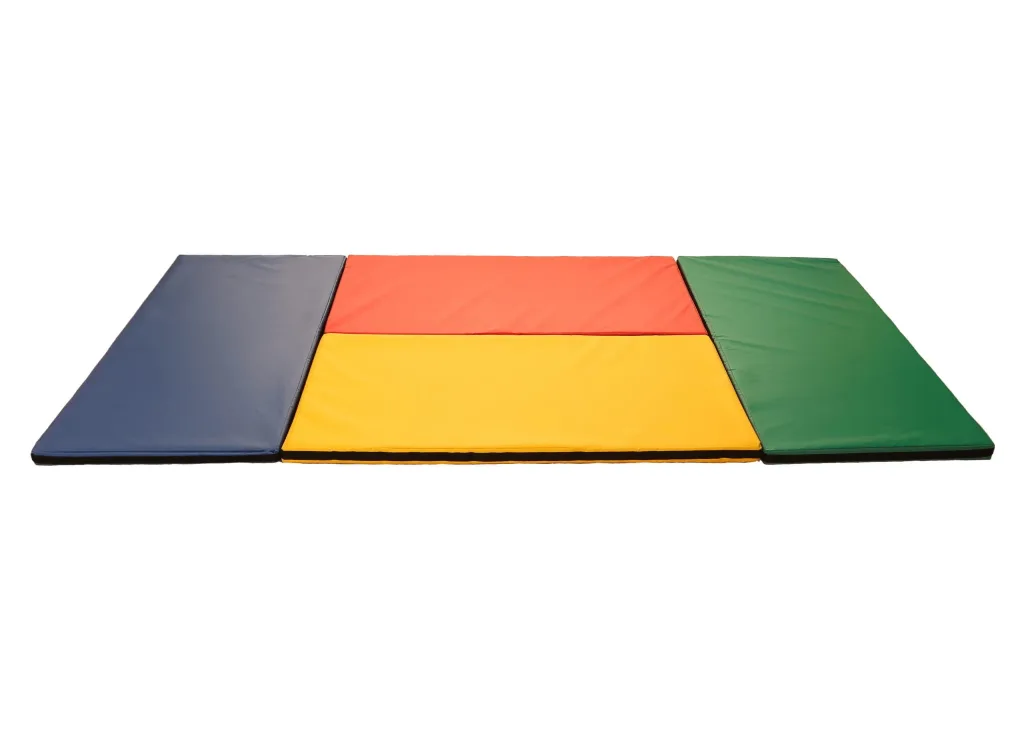 Four tumble mats with fire-retardant PVC covers and velcro link flaps: blue left, green right, red top, yellow bottom forming a low rectangular play area.