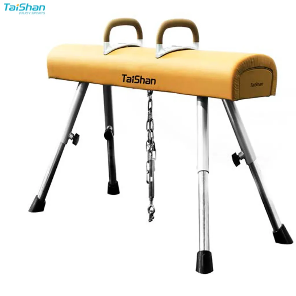 Adjustable low pommel horse with tan polyurethane trunk topped with XPE foam, two brown handles, four steel legs, a hanging chain and TaiShan.