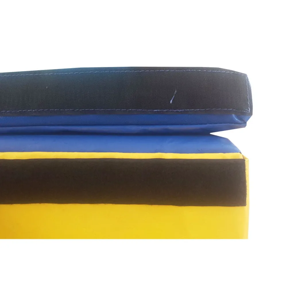 Folded inclined wedge with blue top, yellow sides, black hook-and-loop strips and high-density PU foam with flame-retardant PVC cover.