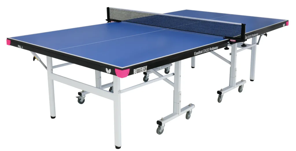 Blue table tennis rollaway with light silver steel legs and undercarriage, magenta corner pieces, four independent wheels per half and central net.