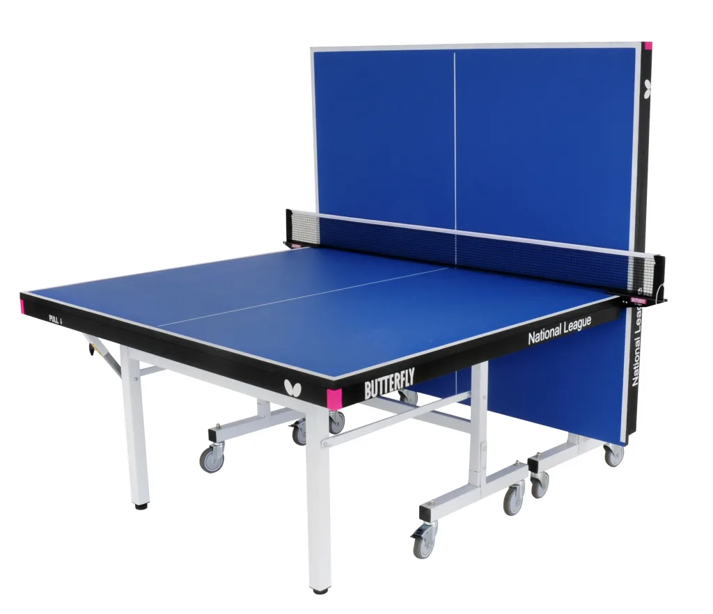 Blue rollaway table tennis table with one half folded upright, light silver legs and undercarriage, wheels, and net.