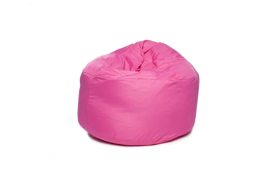 Pink polyester bean bag chair for teens and adults on a white background.