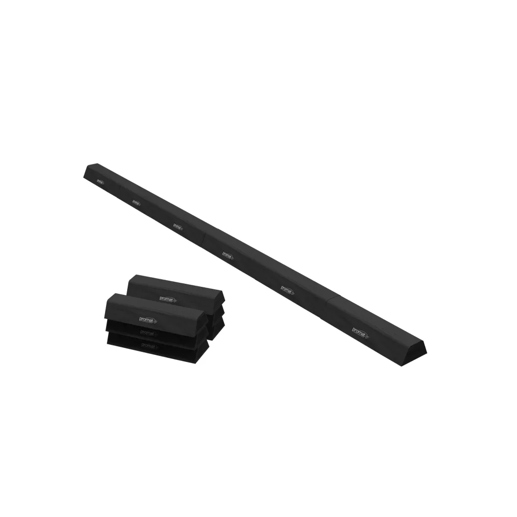 Assembled six-segment foam balance beam lying diagonally with remaining segments stacked nearby, made of PE foam with a heavy-duty flame-retardant PVC cover.