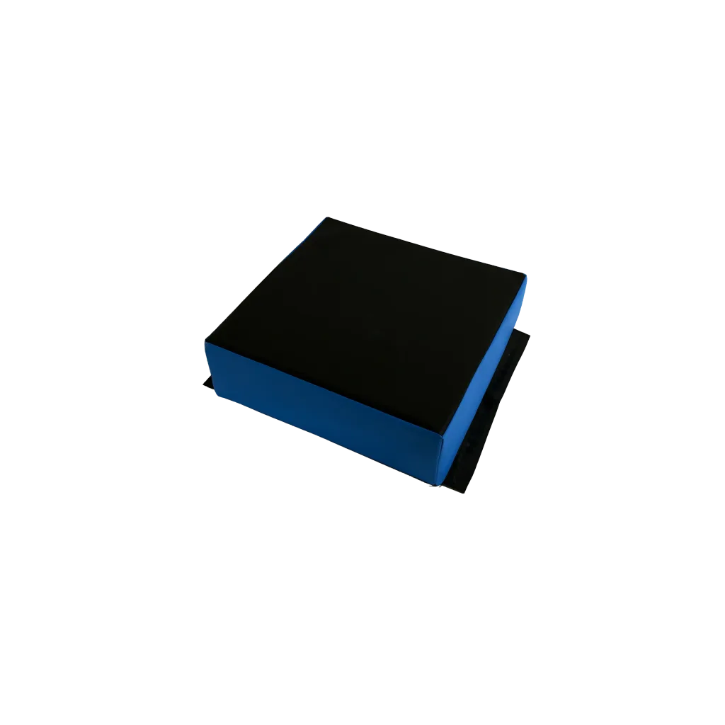 Blue-sided stepping block with a black PVC top and hook-and-loop connector, isolated on a black background.
