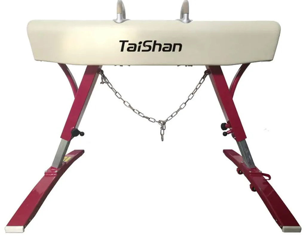 Competition pommel horse labeled TaiShan with genuine leather top, two metal handles and a red steel base connected by a chain.