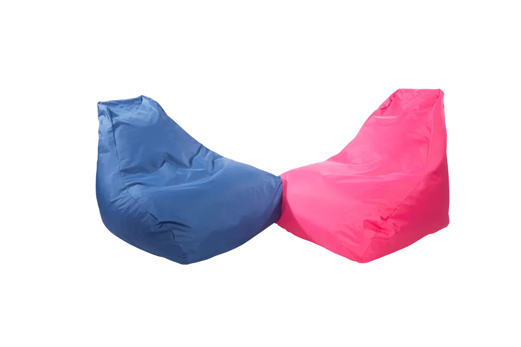 Two polyester child-sized bean chairs, one blue and one pink, shown side by side with raised back support on a black background.