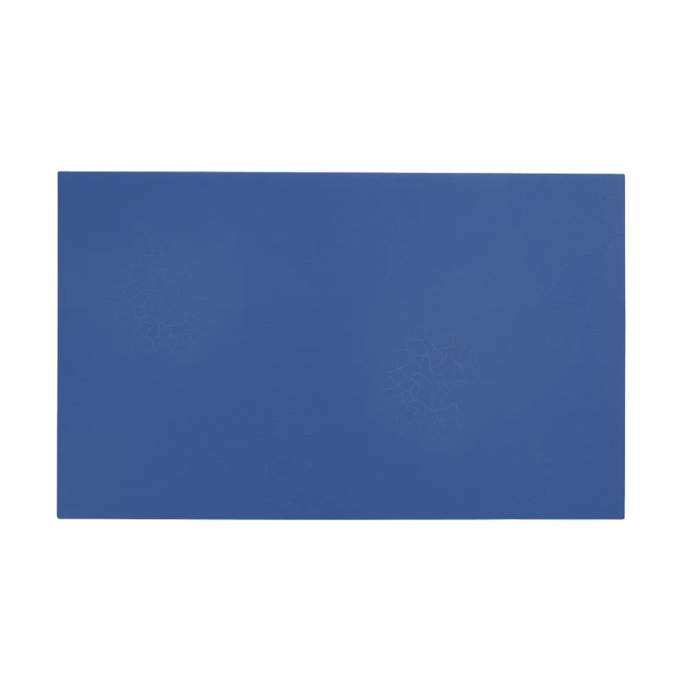 Rectangular blue exercise mat with a subtle tatami-style textured pattern visible in two faint clusters.
