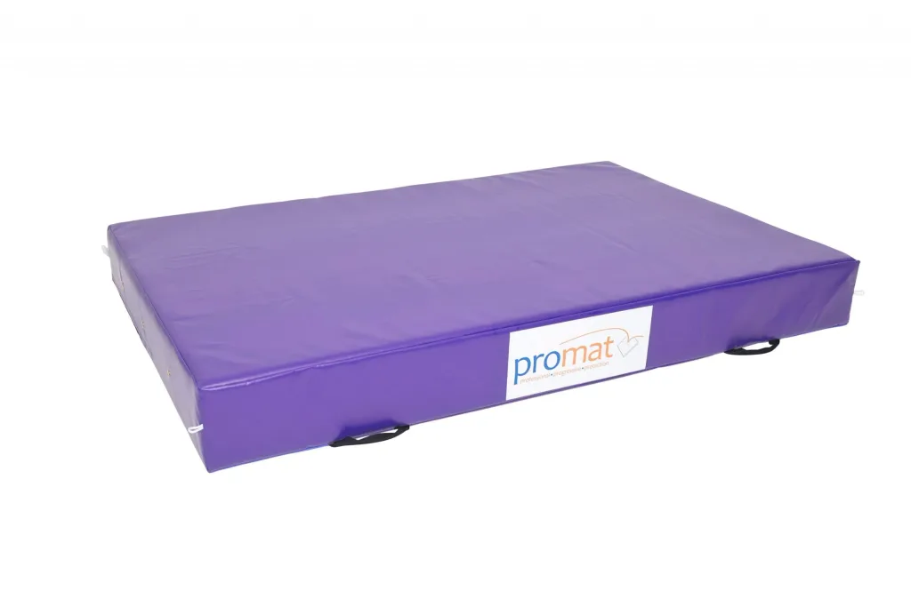 Purple crash mat with PVC zipped cover, carrying handles and anti-slip base, with label reading "promat".