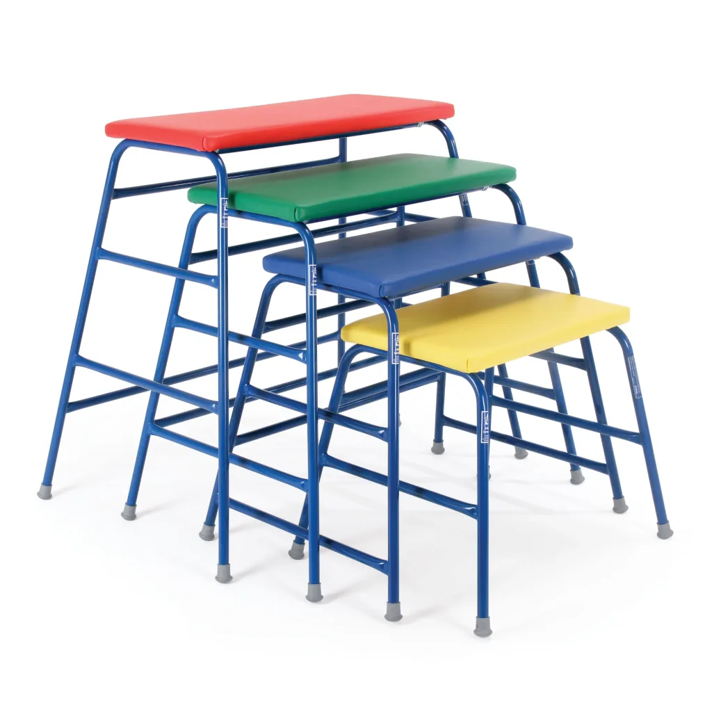 Four stacked padded agility tables with blue powder coated steel frames and red, green, blue and yellow vinyl tops.