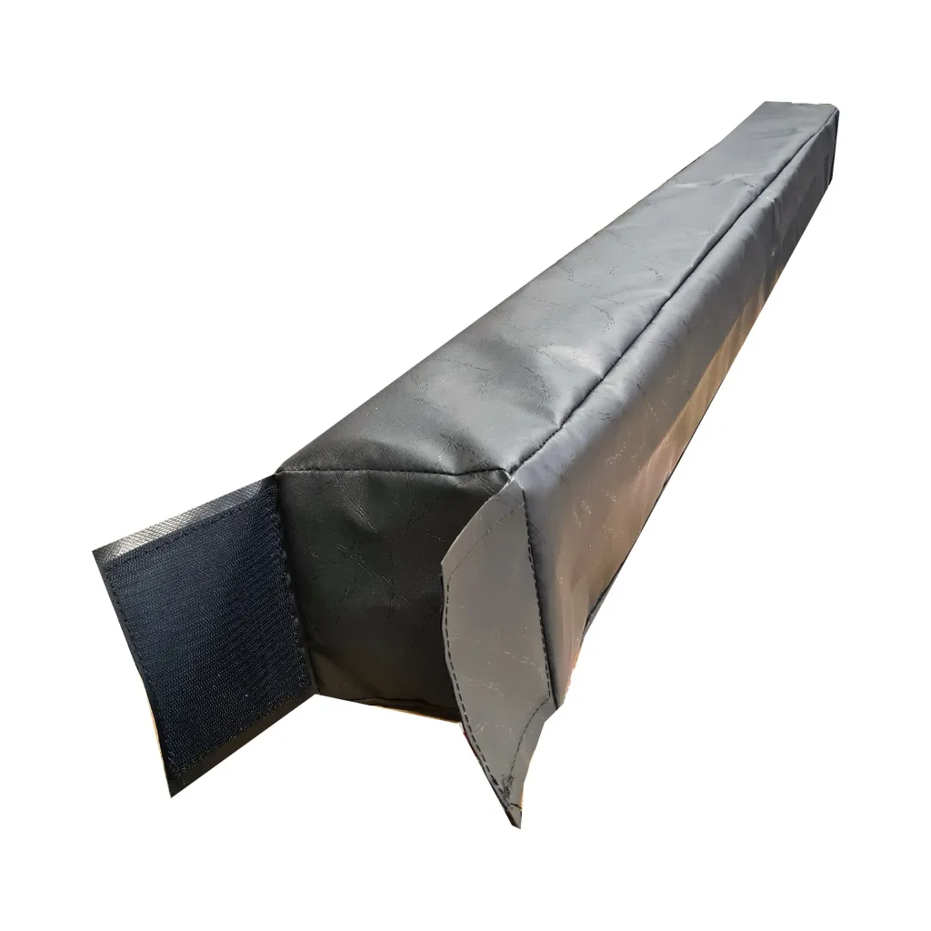 Black PVC-covered foam sports pitch divider with hook-and-loop connector flap visible.