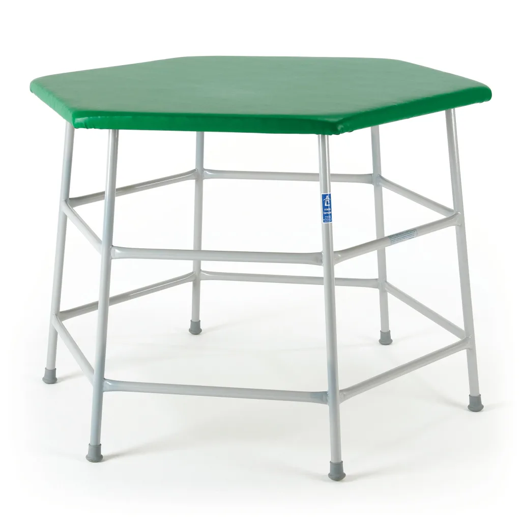 Hexagonal movement table with blue vinyl top over flame-retardant foam and powder-coated steel frame, label reading niels larsen.