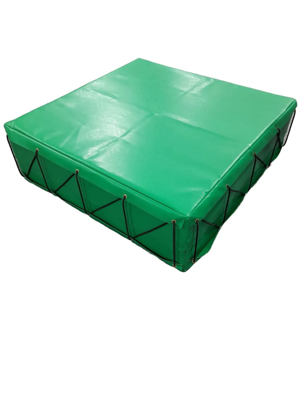 Green keg mat with fire-retardant PVC cover, dual-density foam core, and eyelets with black lacing along the sides.