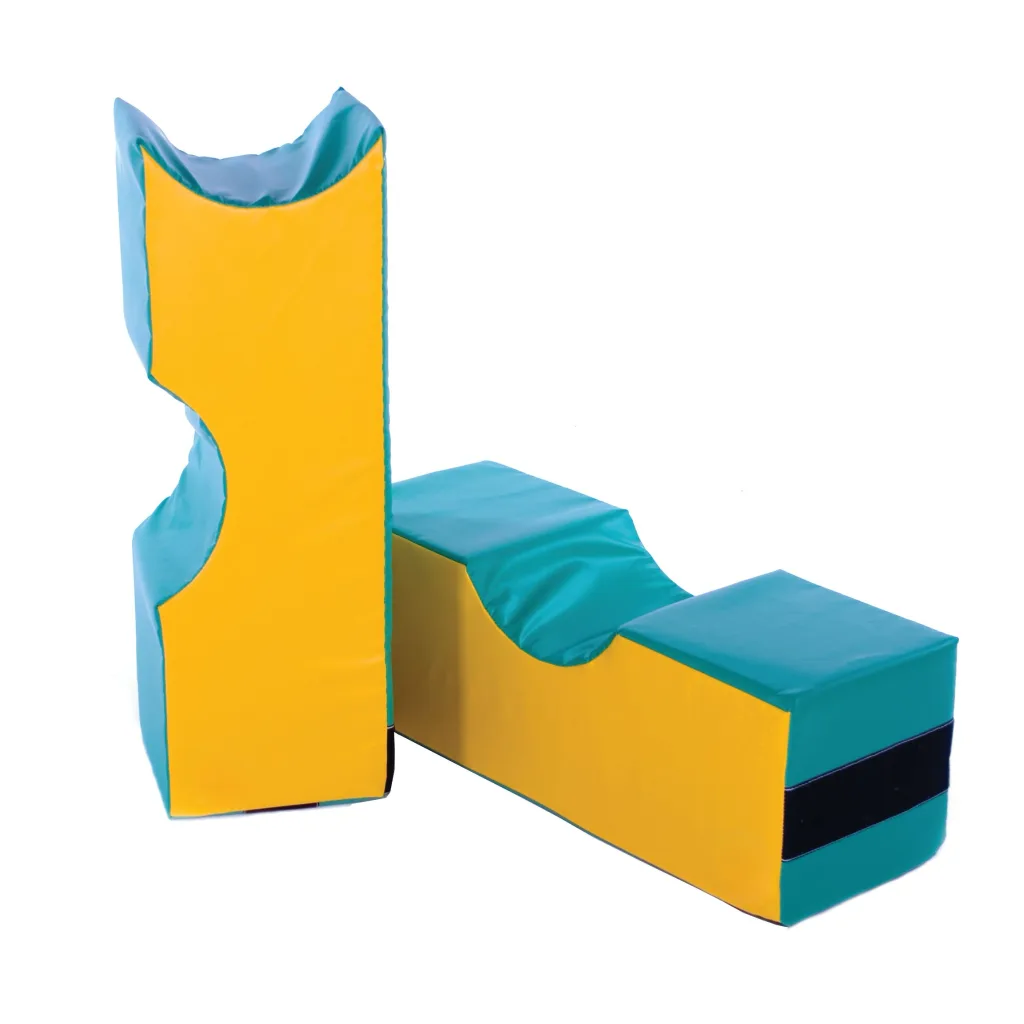 Teal and yellow soft-play foam shapes arranged as a stepped play structure with curved top panels.