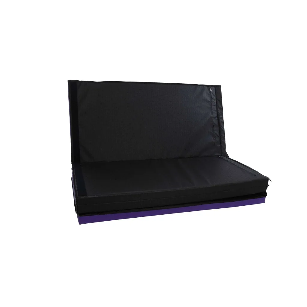 Folded mat with heavy duty PVC cover, one panel upright, black top and purple base.