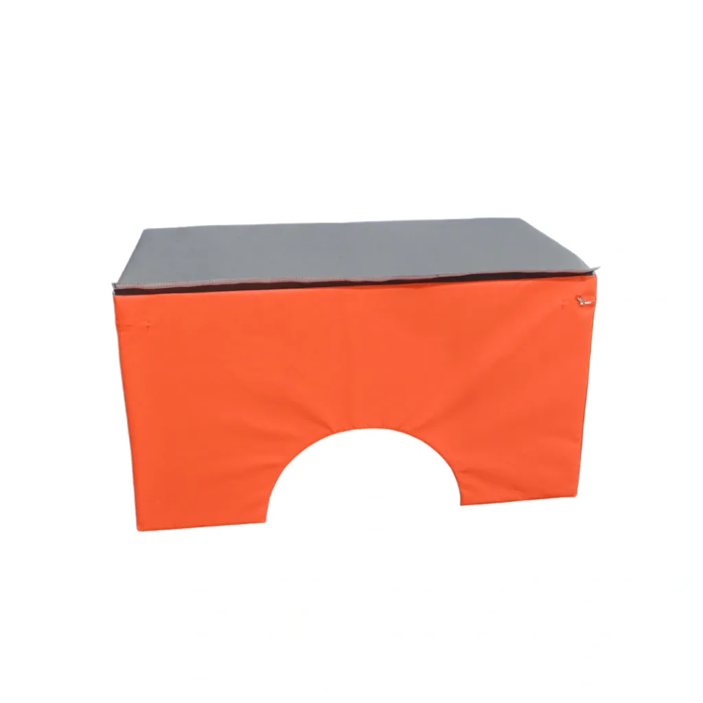 Orange foam soft box with a grey top and an arched doorway cutout on the front.
