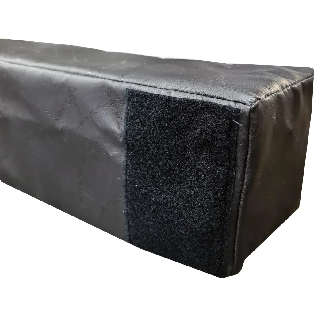 Black PVC-covered foam divider section with a rectangular hook-and-loop connector patch on the end.