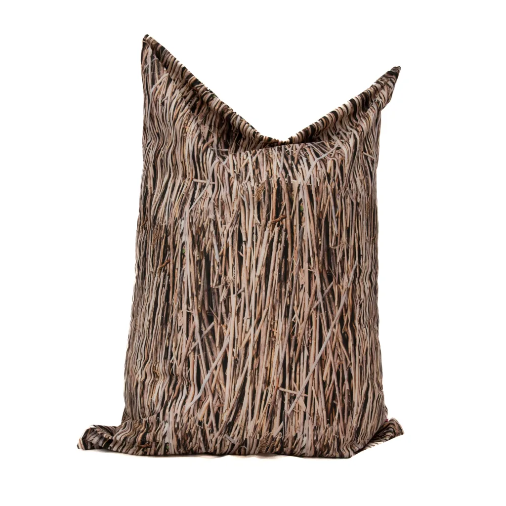 Large nature-print floor cushion with a woven reed pattern on a 100% polyester cover, shown upright on a white background.