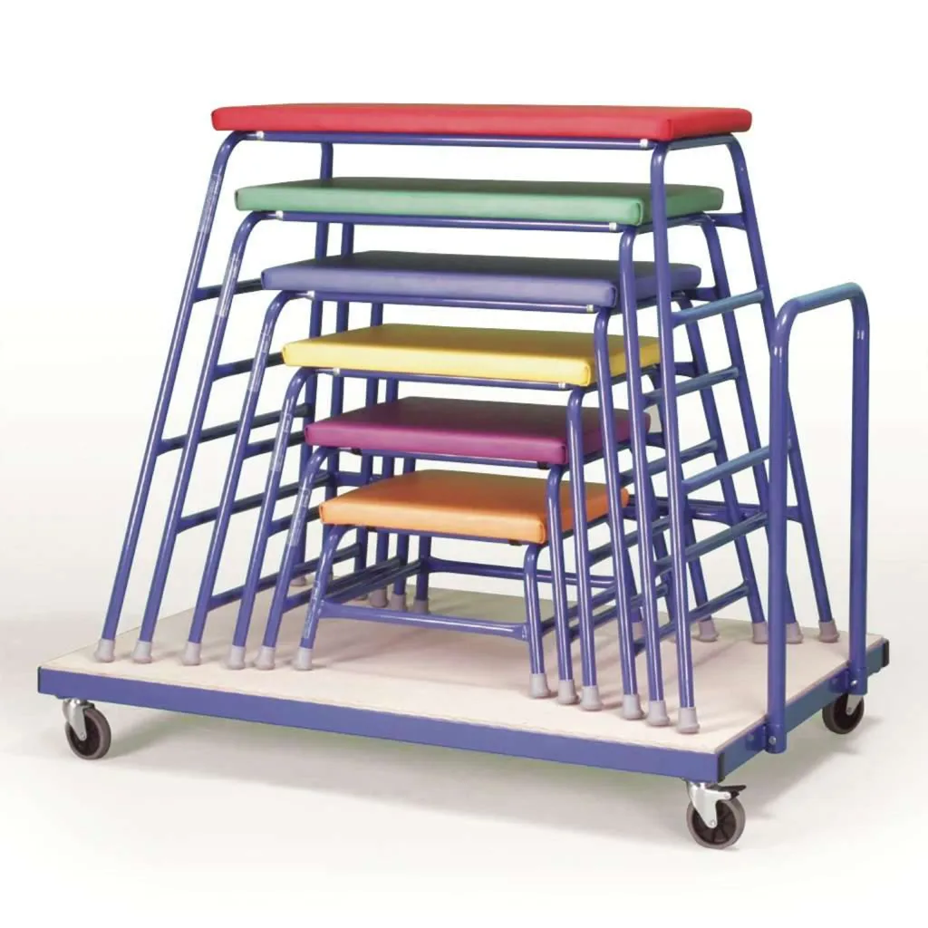 Stacked agility tables with purple metal frames and multicolored padded tops on a wheeled trolley.