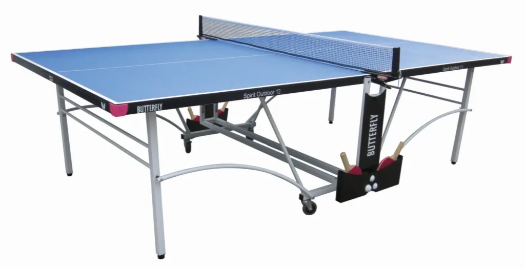 Blue outdoor rollaway table tennis table with light silver legs, net, wheel casters and bat-and-ball holder labeled Spirit Outdoor 12.