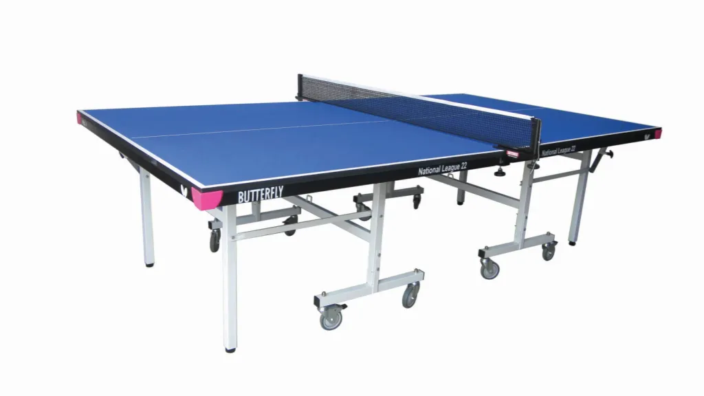 Blue table tennis table National League 22 rollaway with light silver legs, magenta corner pieces, net, and castor wheels.