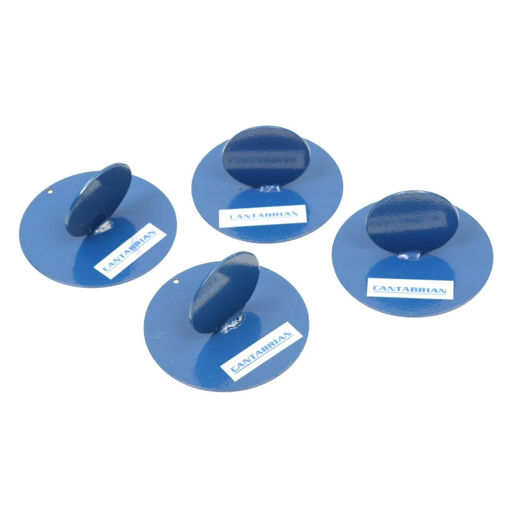 Four blue metal runway markers made from two welded round sheets, each with a small oval handle and label reading Cantabrian.