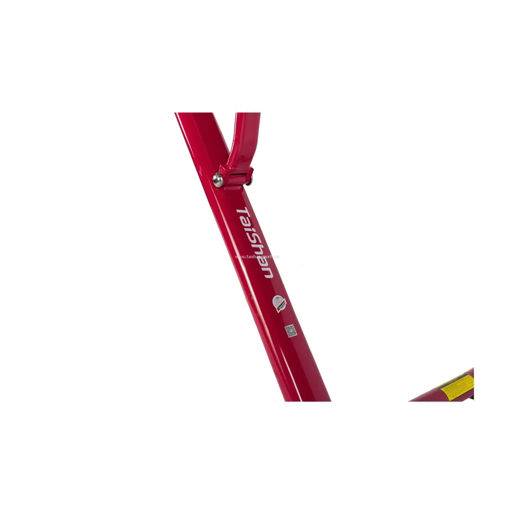 Red metal support leg of a competition balance beam with an adjustable bracket, white Taishan logo and two small stickers.