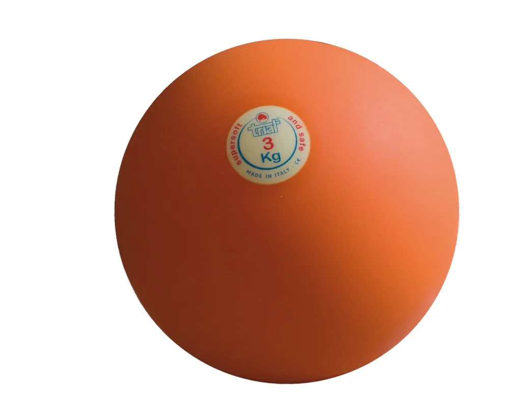 Orange indoor shot put with a centered label reading 3 Kg.