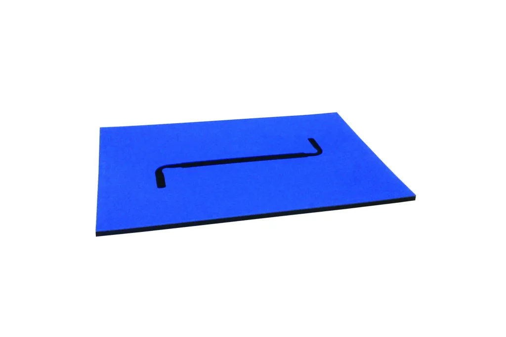 Blue rectangular balance beam mat with a long black recessed slot cut into the center.