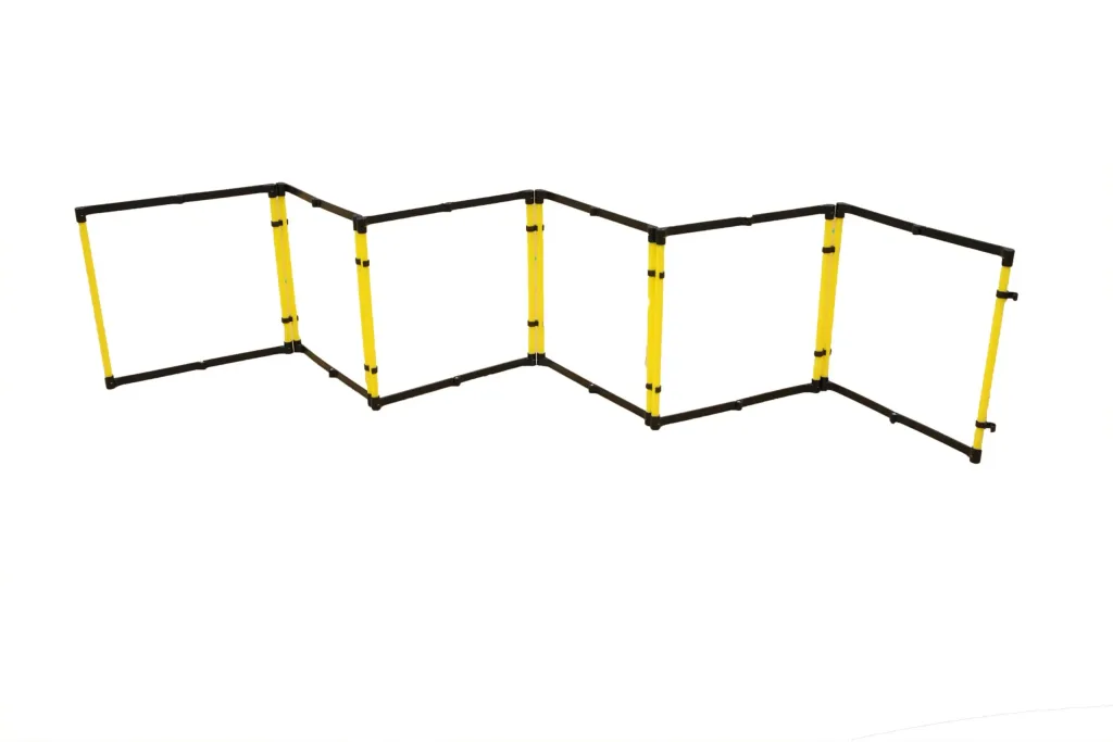 Six yellow and black hurdles linked in a zigzag agility ladder arrangement on a white background.