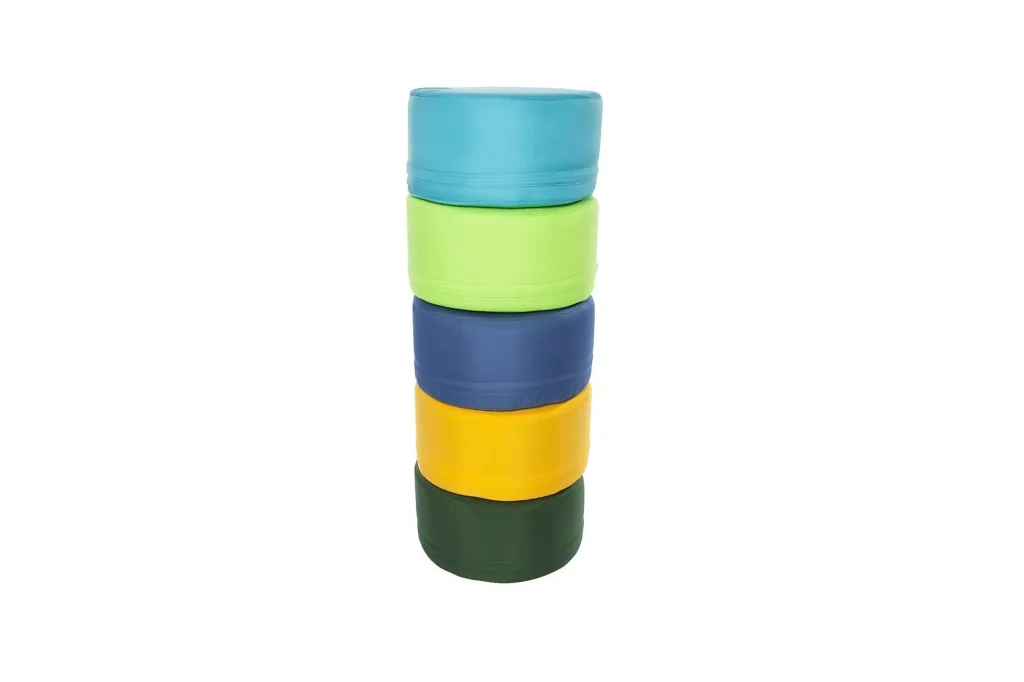 Stacked round polyester foam seating pods, set of five, in light blue, lime green, navy, yellow, and dark green.
