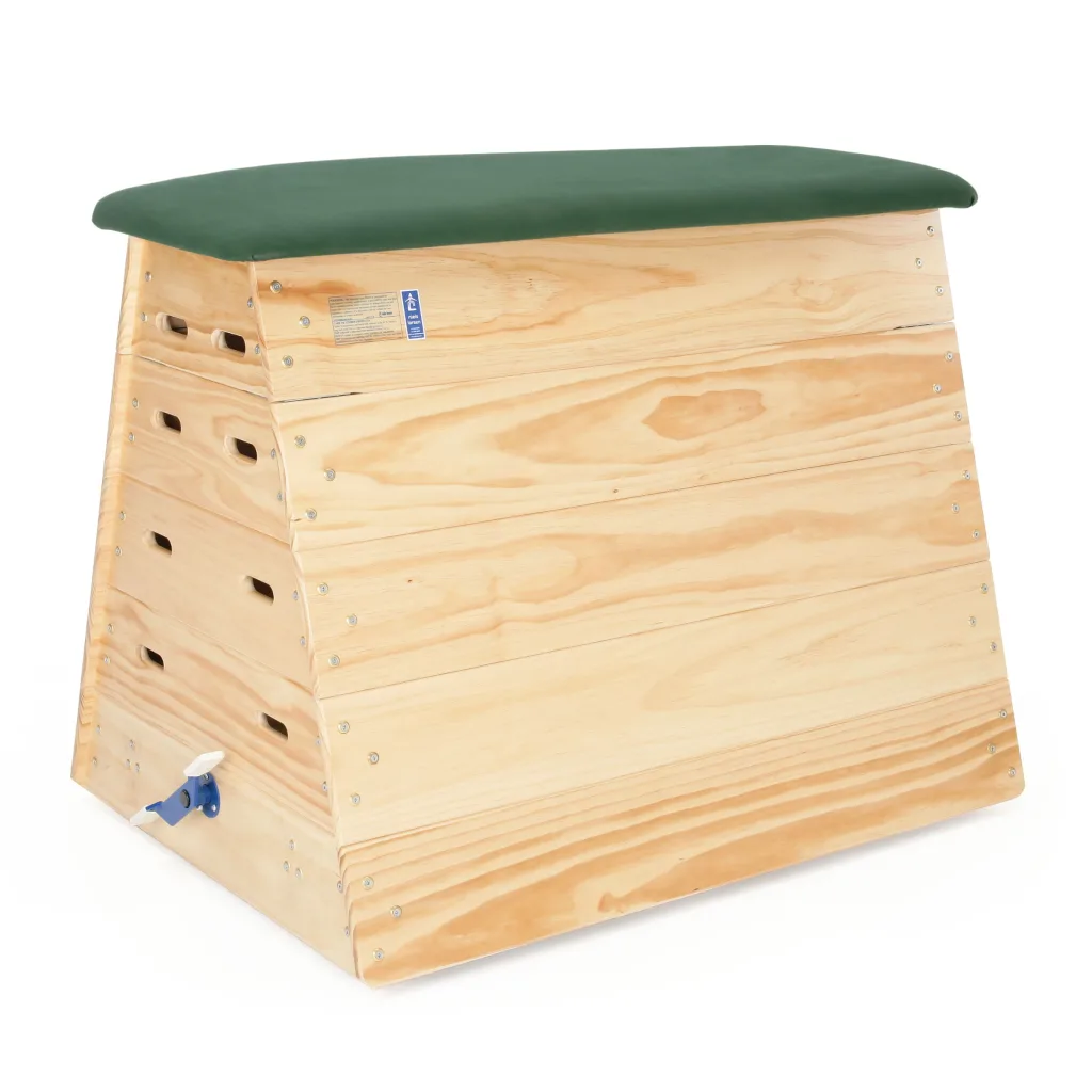 Wooden five-section vaulting box with a green hide padded top, interlocking corner blocks and castors.