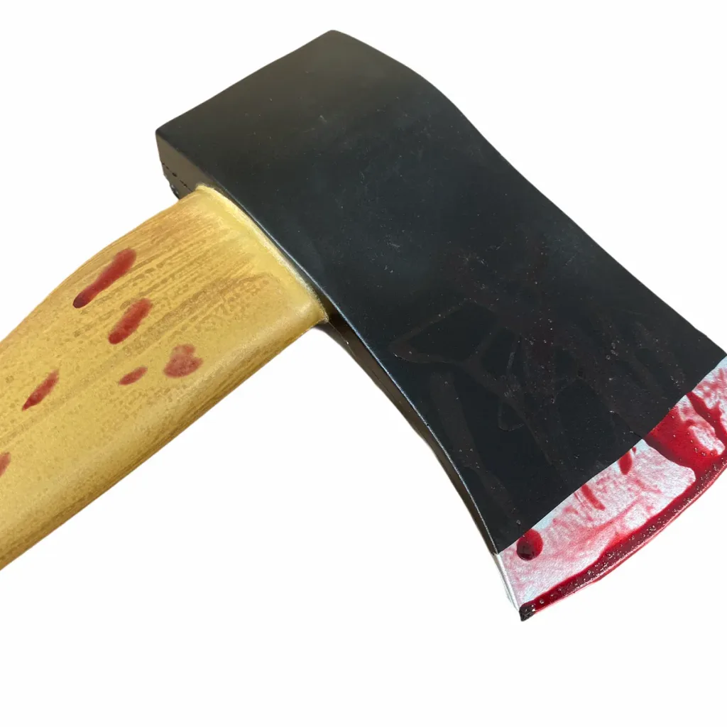 Training hatchet prop made from PU foam with a black head, wood-tone handle and red-stained blade edge.