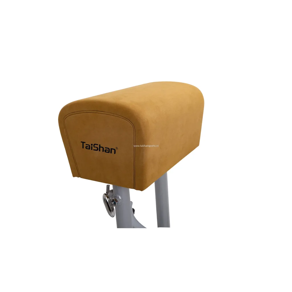 Tan suede vaulting buck top with visible TaiShan logo and a gray metal adjustable base.