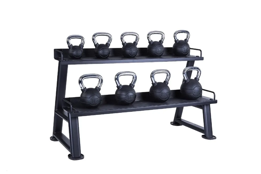 Two-tier matte black kettlebell rack with rubber-matted shelves holding eight kettlebells with chrome handles.