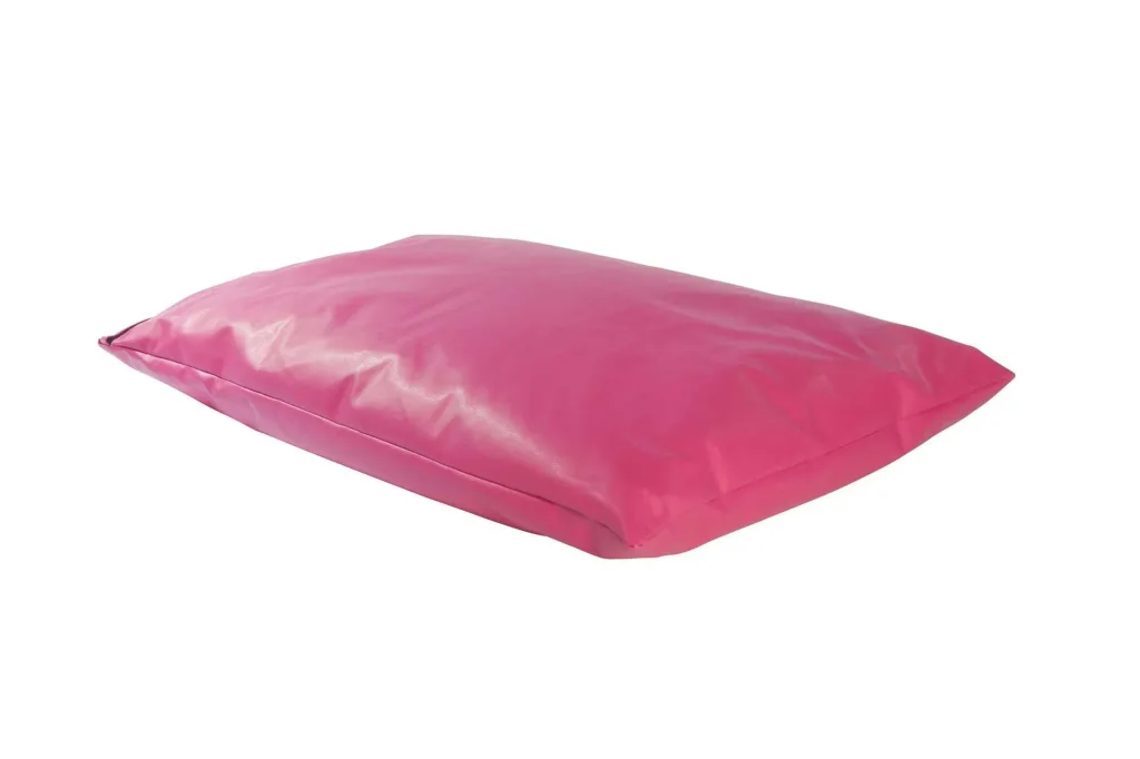 Hot pink faux leather giant child floor cushion lying flat on a white background.