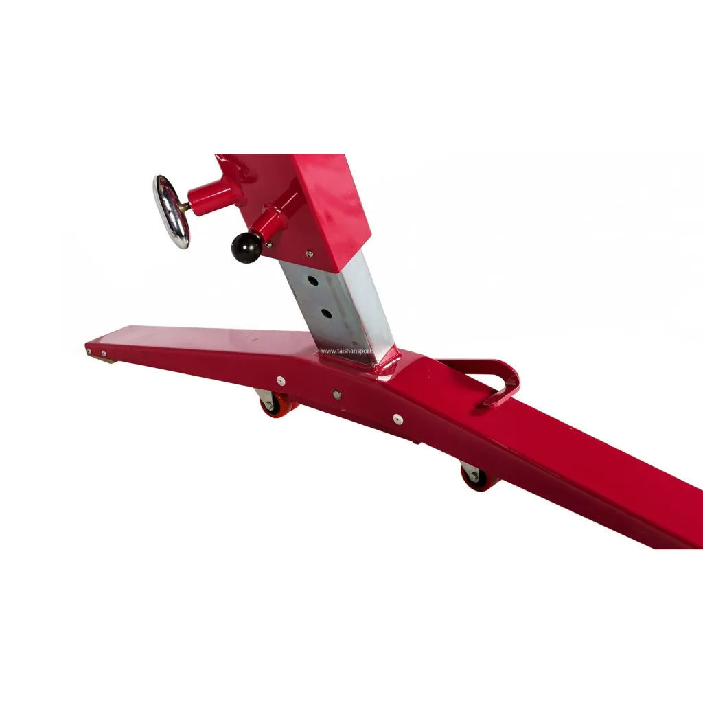 Red steel base and silver adjustable support leg of a competition pommel horse with a height-adjustment handle and small caster wheels.