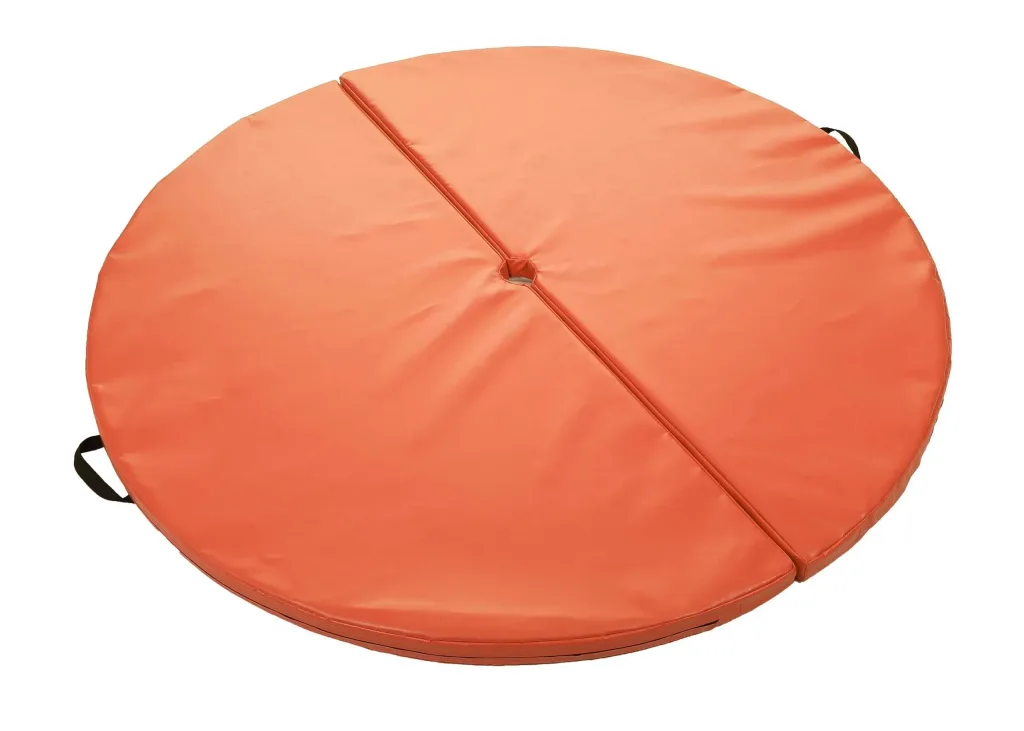 Round two-piece premium pole mat made from heavy-duty PVC with a small central hole, central seam with hook-and-loop fastening, and fixed carry handles.