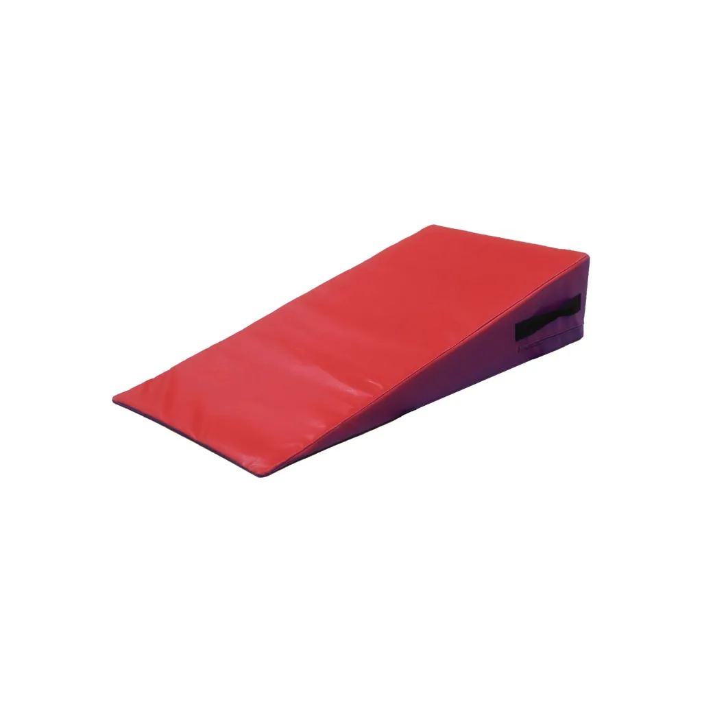 Inclined wedge with red top and bottom, yellow sides, PVC-covered foam slope with side carrying handles.