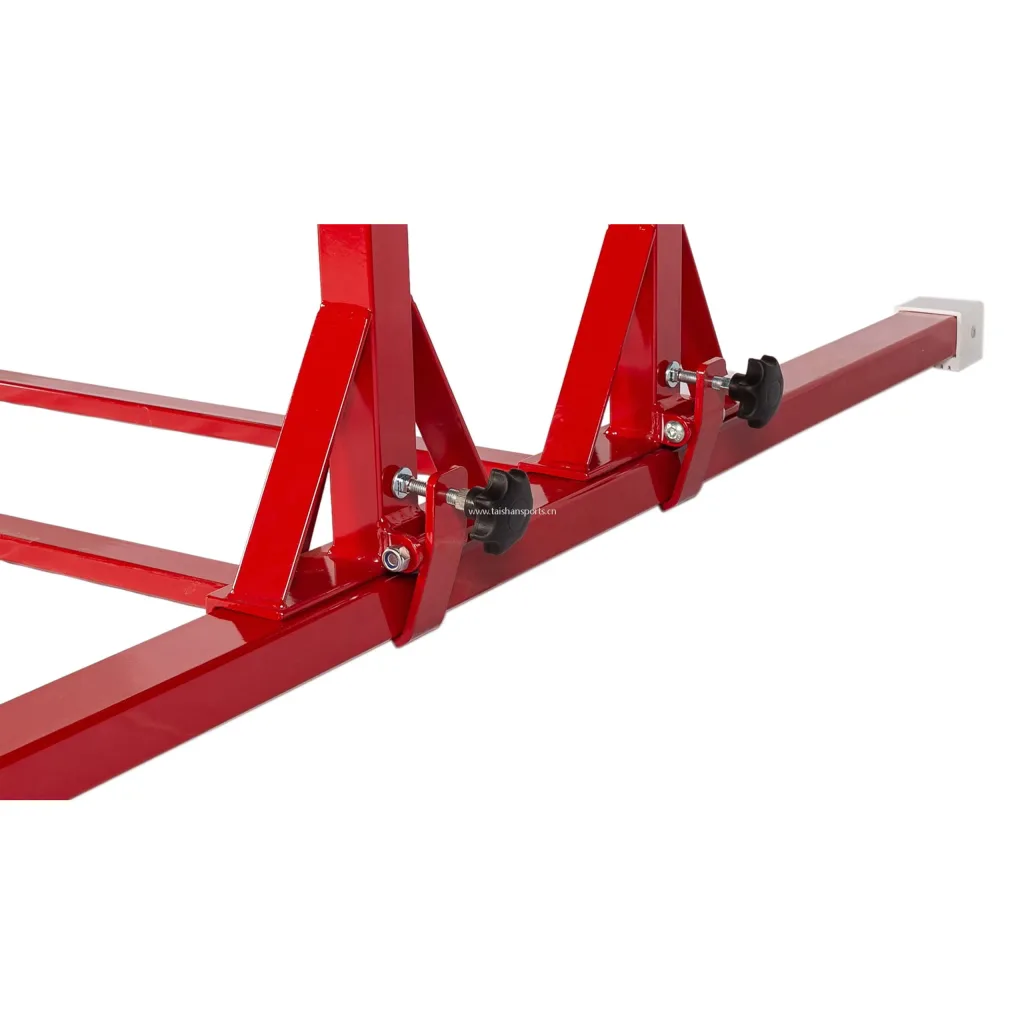Red carbon steel base with triangular uprights, black plastic height-adjustment knobs and white foot cap for kids parallel bars; text 'www.taishansports.cn'.