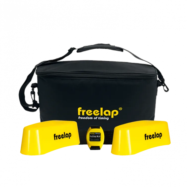 Black carrying case with yellow freelap freedom of timing logo, flanked by two yellow timing pads and a small central yellow transponder.